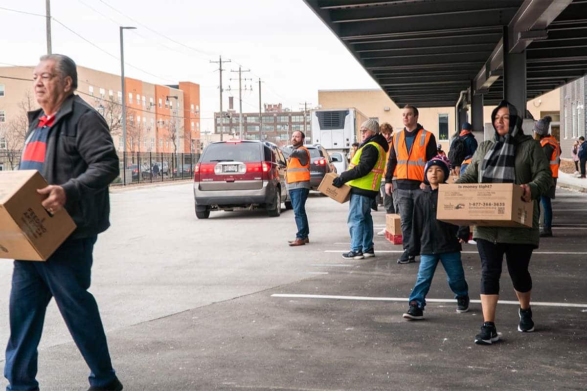 Cristo Rey Jesuit High School partnered with Feeding America to help local families in need | 4 | Phoenix Investors